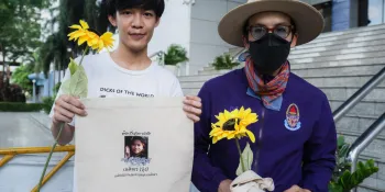 Thanapat Kapeng (left) and Chaiamorn Kaewwiboonpan (right) after being released on bail. (Photo by Ginger Cat)