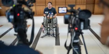 Auttapon Srichitsanuwaranon speaking to the media before filing his letter.