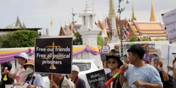 Protesters marching to the Supreme Court on 13 June carry signs calling for bail for political prisoners.