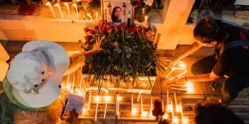 Protesters lit candles and place flowers in mourning of Netiporn. (Photo by Ginger Cat)