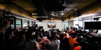 Move Forward Party's supporters gathered at the party's headquarters at the Future Forward building to watch the live broadcast of the Constitutional Court ruling on the party's dissolution.