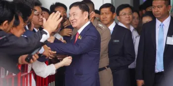 Ruling Pheu Thai Party and Thaksin hit with treason petition