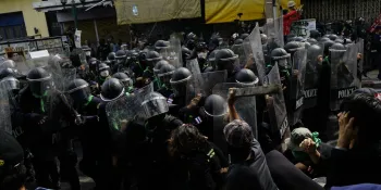 Crowd control police cracking down on protesters during the 18 November 2022 protest.