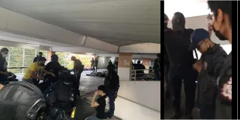 Armed police officers arrested 45 members of the We Volunteer protest guard group in a shopping mall parking lot on 6 March 2021 (Photo from TLHR)