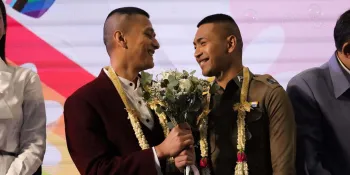 Pol Sen Sgt Maj Pisit Sirihiranchai (right) married his boyfriend, Chanathip Sirihiranchai, at the Marriage Equality Day event at Siam Paragon on 23 January.