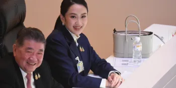 Prime Minister Paetongtarn Shinawatra seated with Minister of Defence Phumtham Wechayachai during the second night of debate on 26 March. (Photo from the government website)