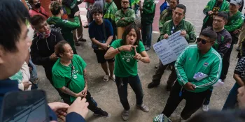 A group of deaf and hearing-impaired people gathered at the NBTC office on 4 July to demand funding for the Thailand Telecommunication Relay Service (TTRS), whose operation has been suspended since 13 June due to a delay in budget approval. (Photo by Kotcharak Kaewsurach)