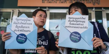 Participants in the 17 September protest holding signs demanding that a new Constitution must be drafted by elected representatives. (Photo by Ginger Cat)