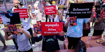 Protesters in front of parliament on 12 December 2024 holding signs calling for the release of political prisoners. (File photo/Ginger Cat)