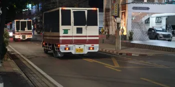 Trucks with blacked-out windows leaving the Bangkok Immigration Detention Centre on the night of 25 February 2025, reportedly taking detained Uyghur refugees to the airport.